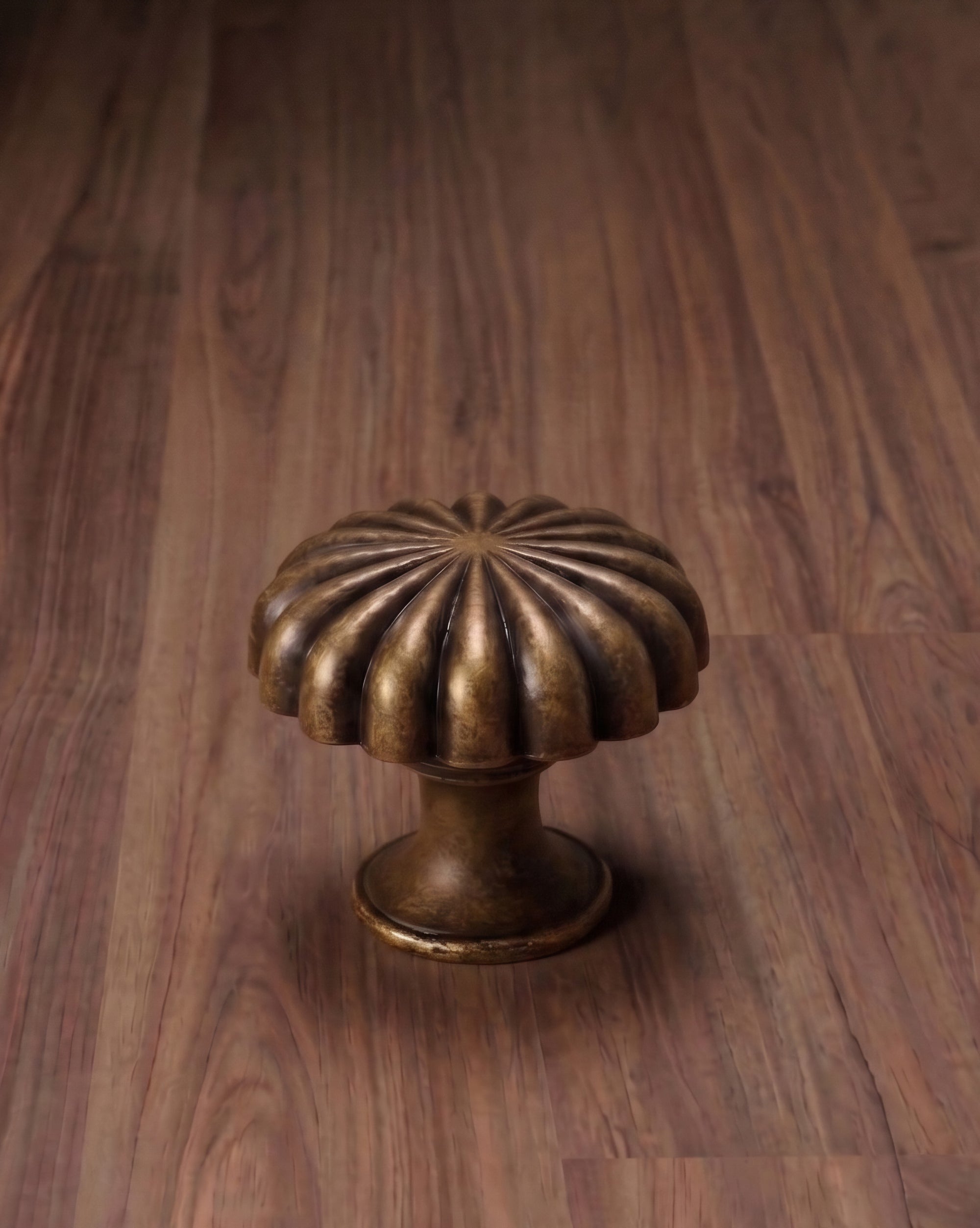 The Solano Ribbed Antique Brass Cabinet Knob
