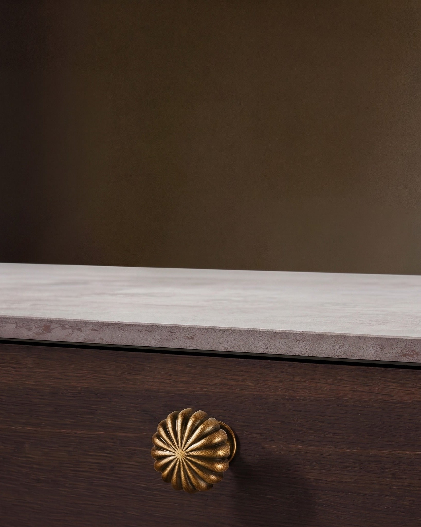 The Solano Ribbed Antique Brass Cabinet Knob