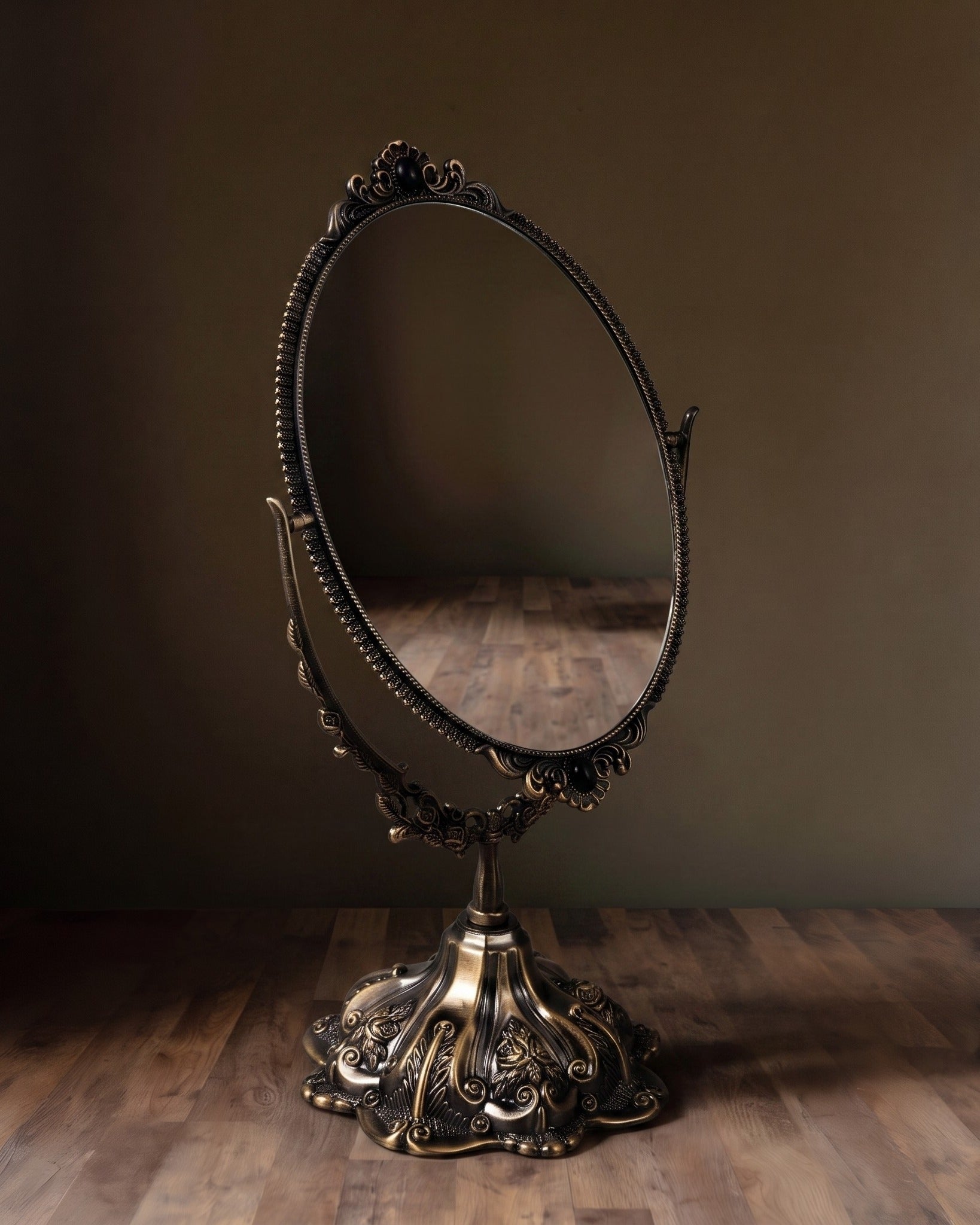 The Renaissance Oval Swivel Mirror  Ornate Dual-Sided Tabletop Vanity Mirror in Antique Bronze Finish